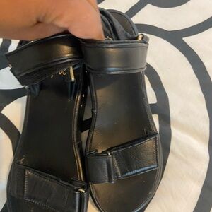 Beek Black Leather Sandals with Gold Accents